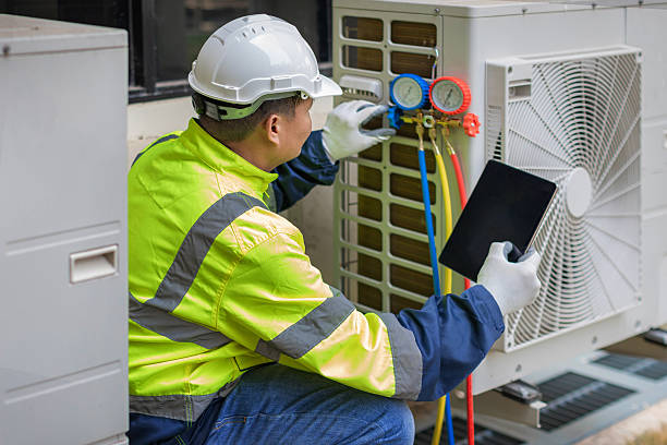 Professional Hvac technician working in Saint Georges, DE